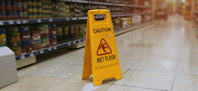yellow sign caution wet floor